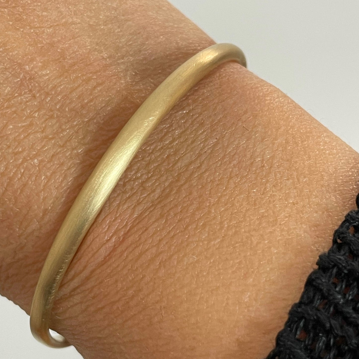City Chain Cuff, top view, on wrist