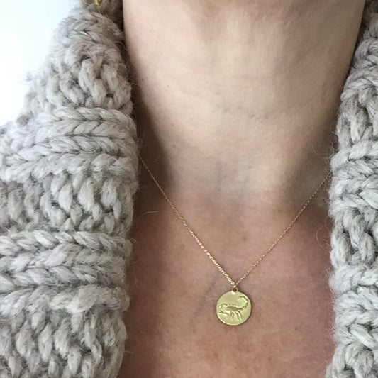 Scorpio Medal with cable chain on neck