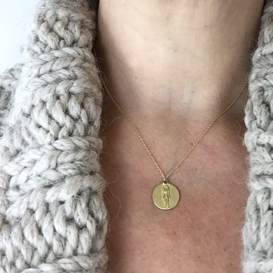 Virgo Medal on cable chain on neck