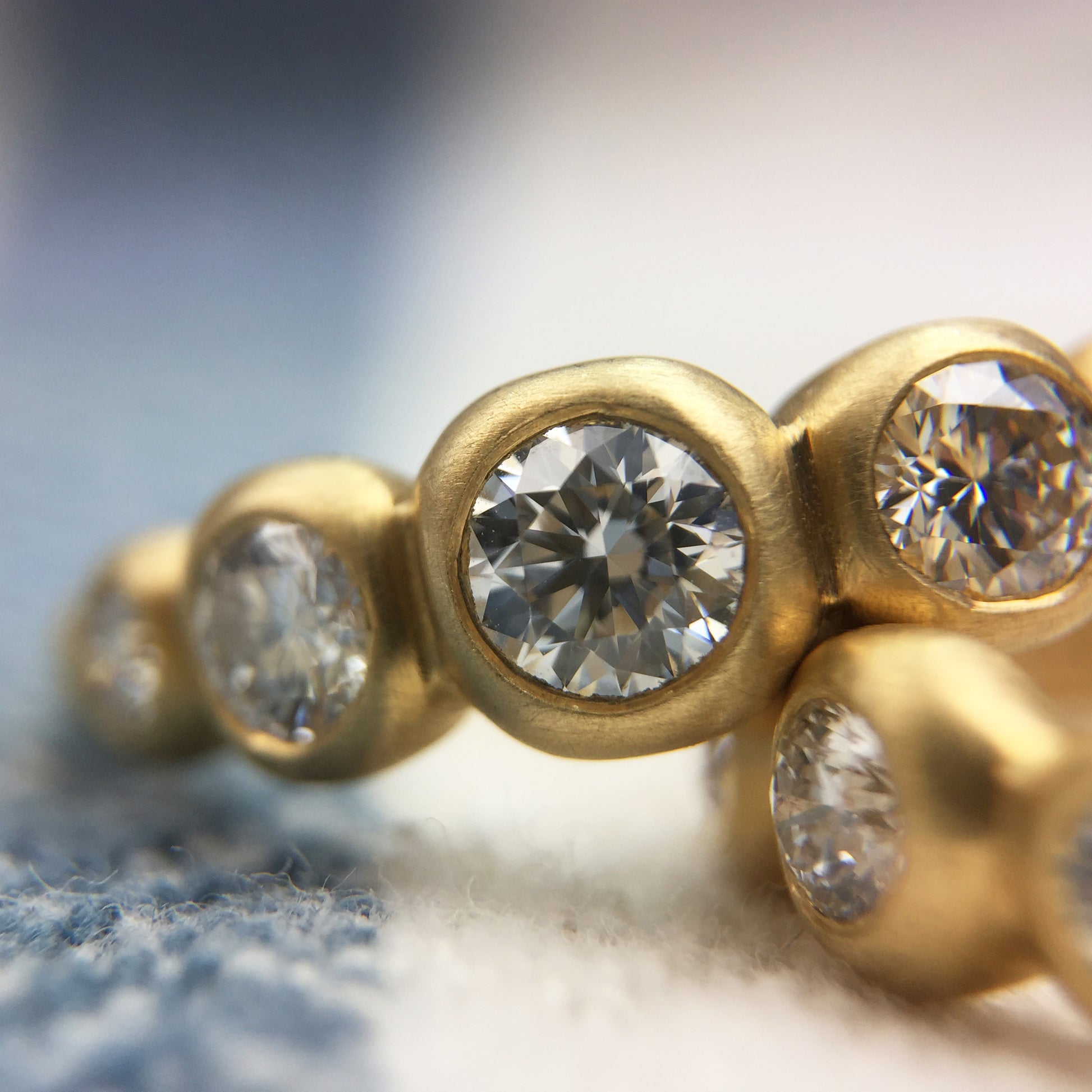 Kima Ring with diamonds, 25 point center stone, detail