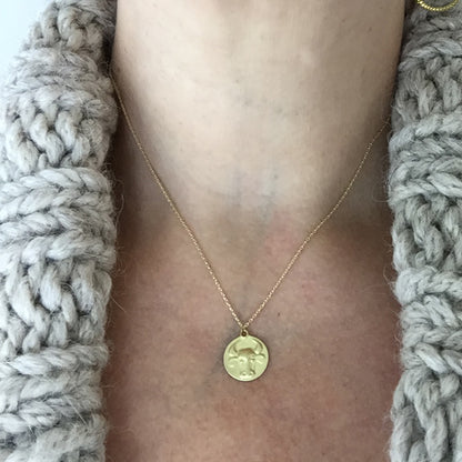 Taurus Medal on cable chain on neck