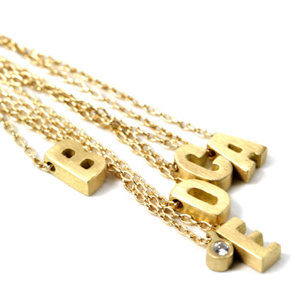 Micro Initials on cable chain, B, E with diamond tag, D, C and A
